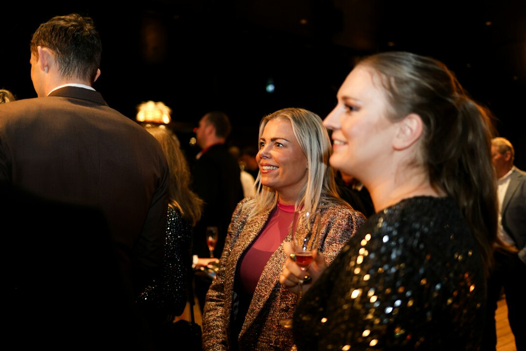 business professionals networking at event