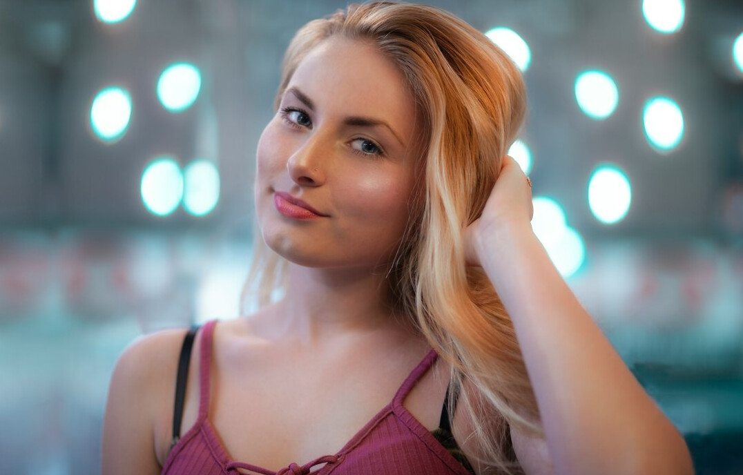Portrait of a smiling young woman with blonde hair